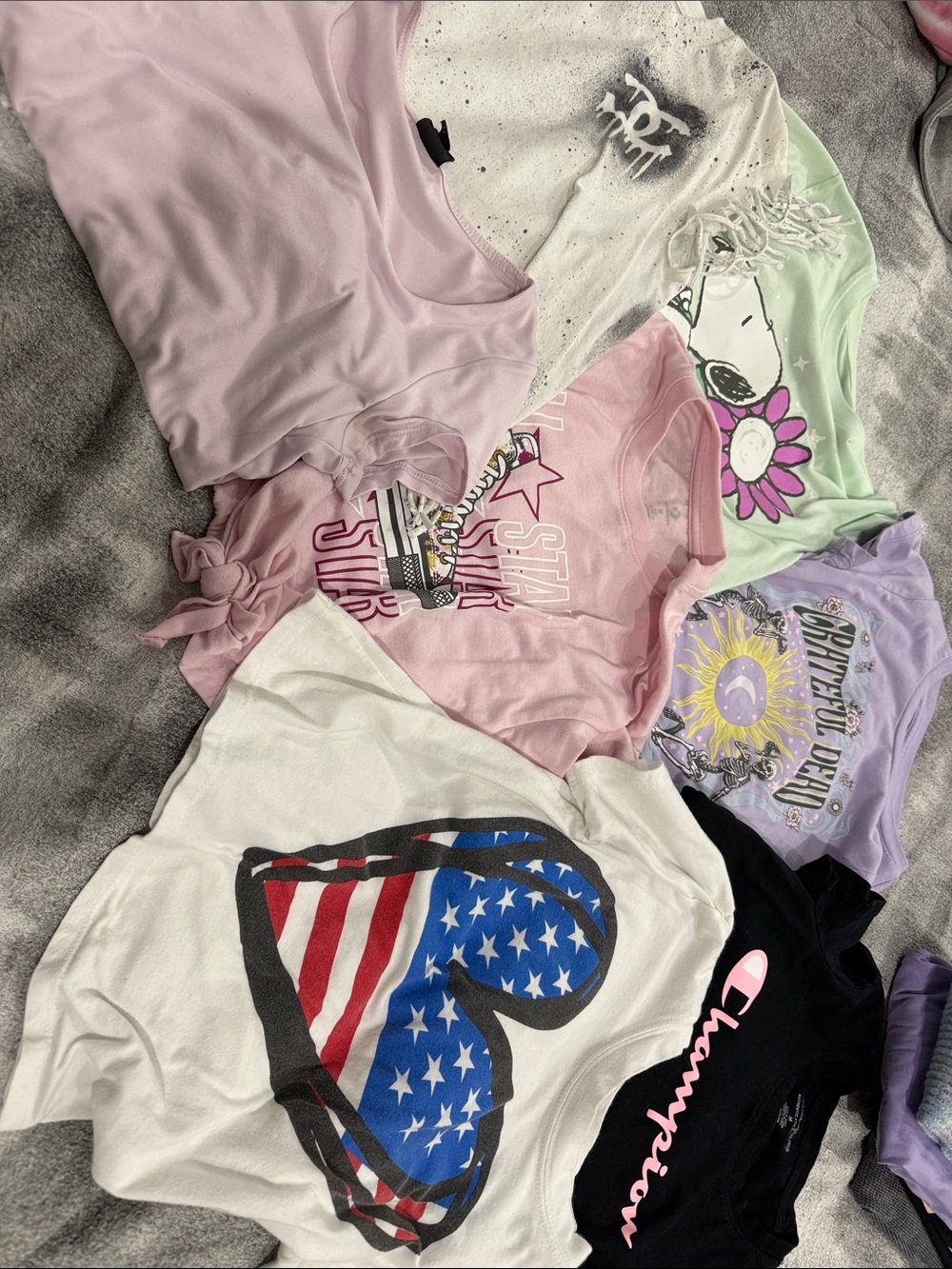 7 different girl t shirts size small/medium